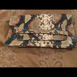 Snake skin clutch bag